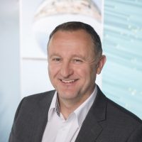 Lächelnder Citycom Mitarbeiter